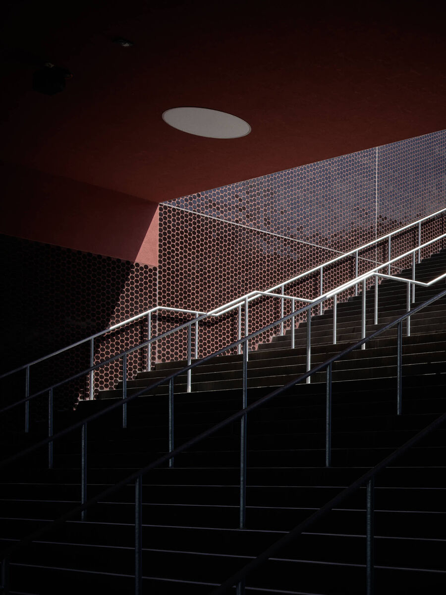 Architekturfotografie der Swiss Life Arena in Zürich von Caruso St. John – eine fotografische Serie vom Rohbau bis zur fertigen Architektur, mit Betonstrukturen, Licht, Treppen und Fassaden.