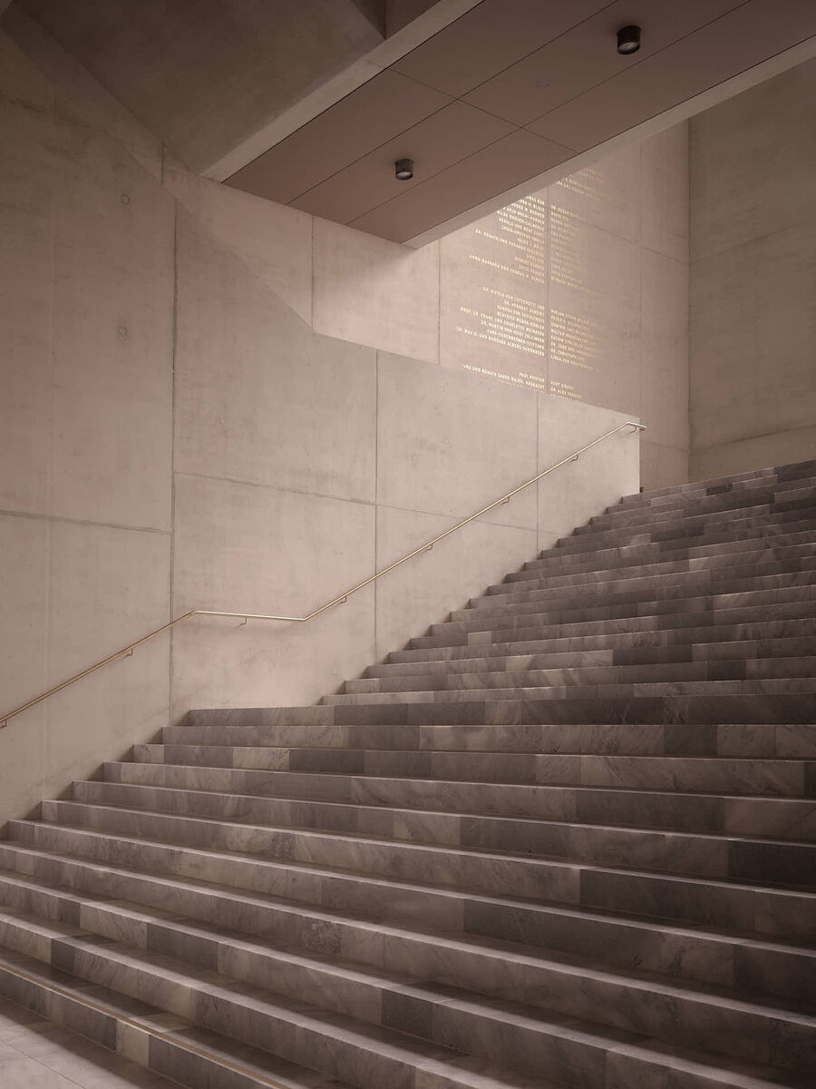 Architekturfotografie des Erweiterungsbaus des Kunsthaus Zürich von David Chipperfield Architects – Sichtbeton, Stein, Messing und Licht in klarer Komposition.